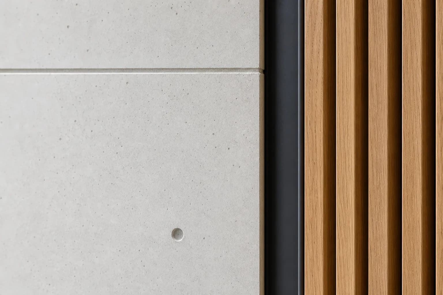 Concrete, black steel, and timber material detail